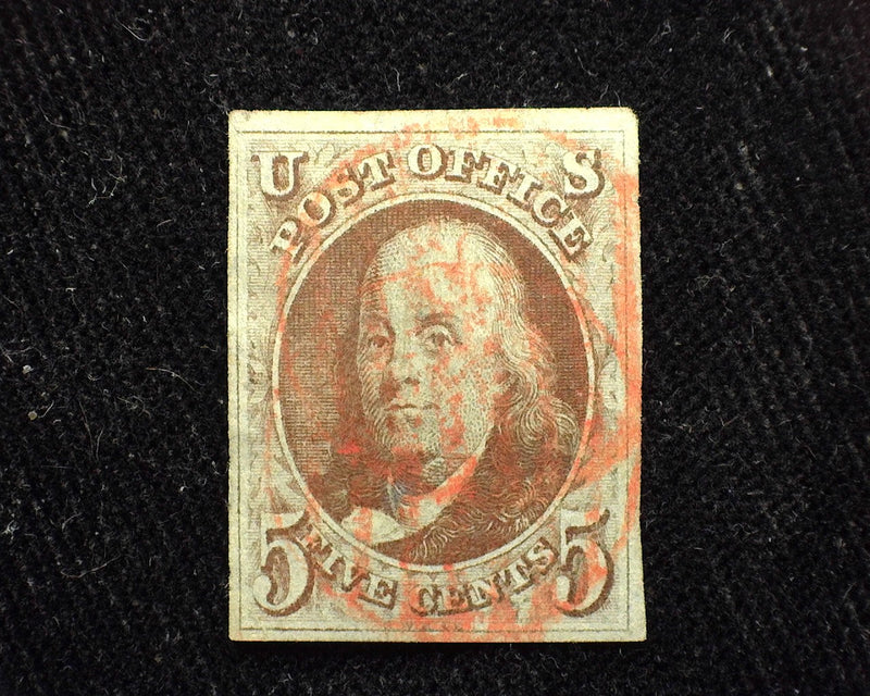 #1 1847 Issue. Large equally balanced 4 margin stamp. Brown color with red grid cancel. Lovely stamp. XF Used  - US Stamp