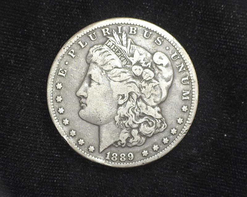 1889 CC Morgan Dollar Rim hit. F - US Coin