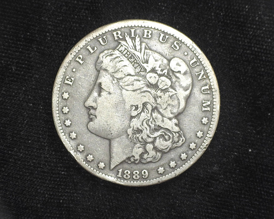 1889 CC Morgan Dollar Rim hit. F - US Coin