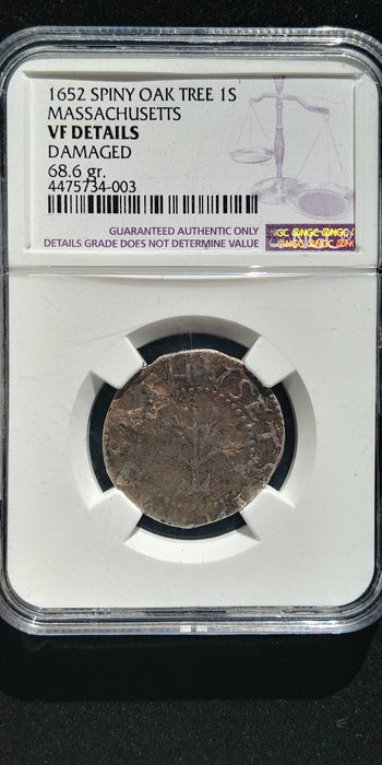 1652 Massachusetts Spiny Oak Tree 1 Schilling NGC VF Details Damaged, Slight Bend in Coin which we believe is a tooth bite. Very Scarce