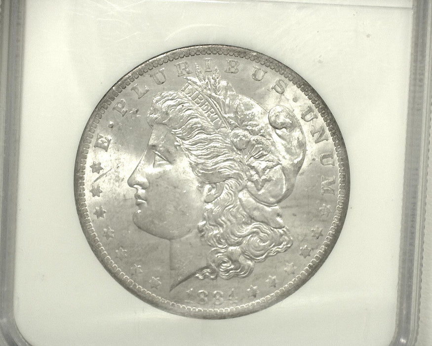 HS&C: 1884 O Morgan Dollar NGC - MS-64 Coin
