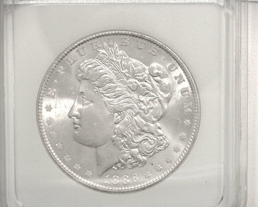 HS&C: 1886 Morgan Dollar NNC - MS-65 We feel is MS-64. Coin