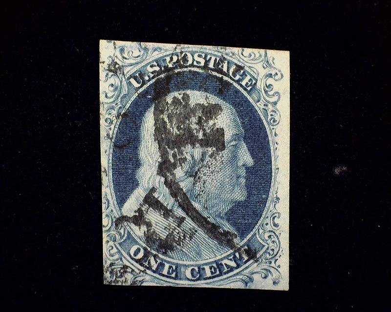#7 1c Blue Just clearing 4 margin stamp. Good color. F/VF Used - US Stamp