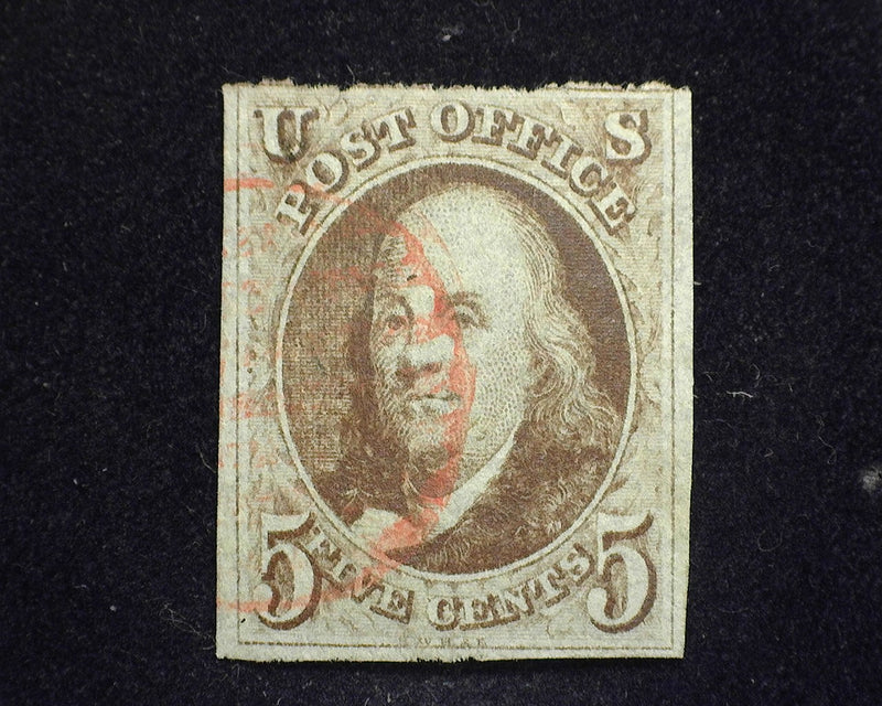 #1 1847 Issue. Three large margins with top margin touching. Deep vivid sharp impression and color stamp . Very faint Red Town cancel. VF/XF - US Stamp