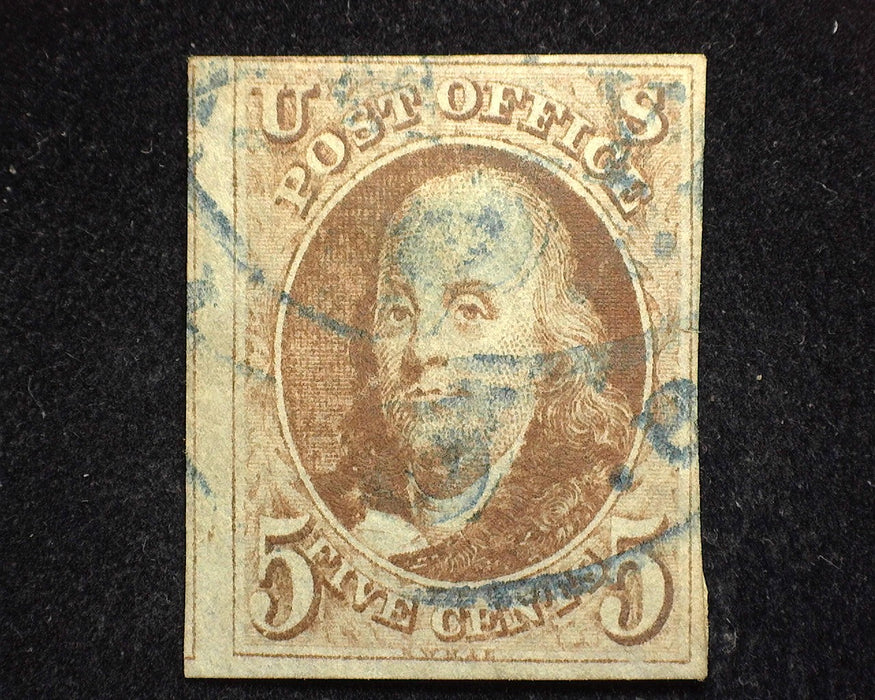 #1 1847 Issue Full 4 margin stamp with 3 sides huge. Faint Blue Circle cancel. Rich color and sharp impression. Used XF US Stamp