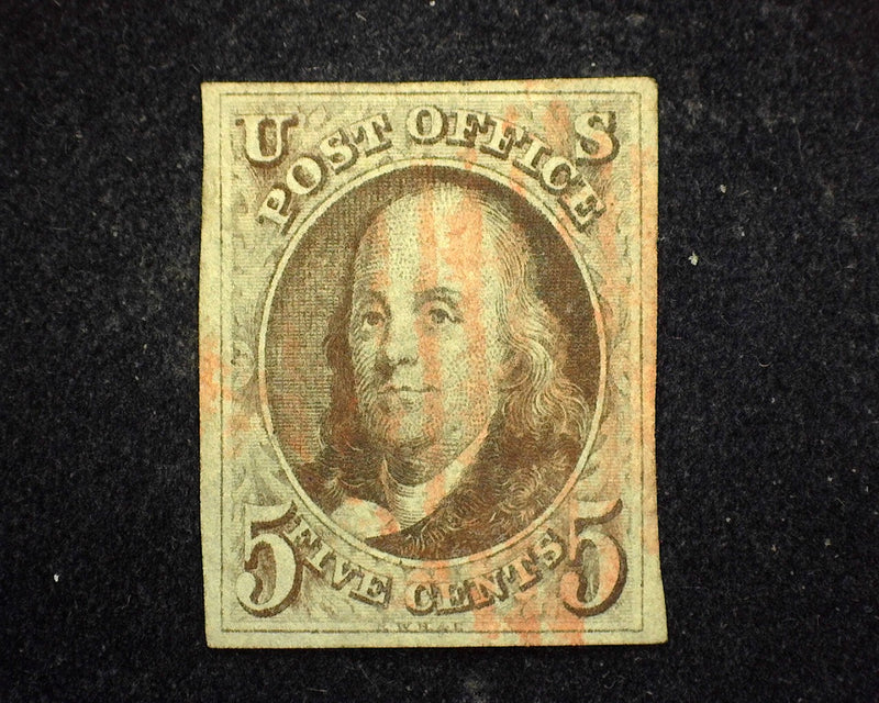 #1 1847 Issue. Large 4 margin copy with great deep color and sharp impression. Faint red grid cancel. XF/Sup Used - US Stamp